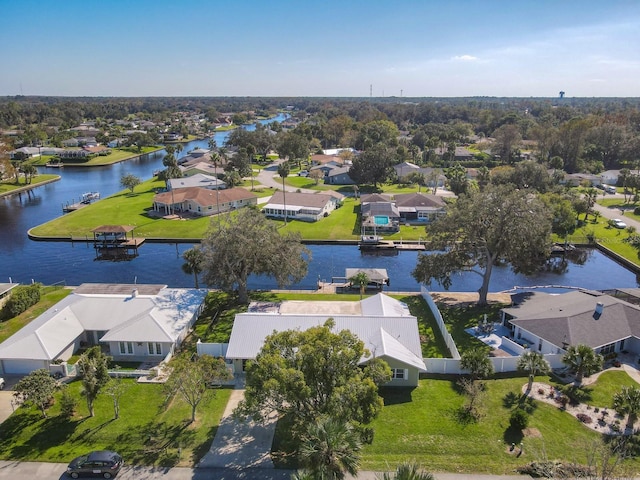 aerial view with a water view and a residential view
