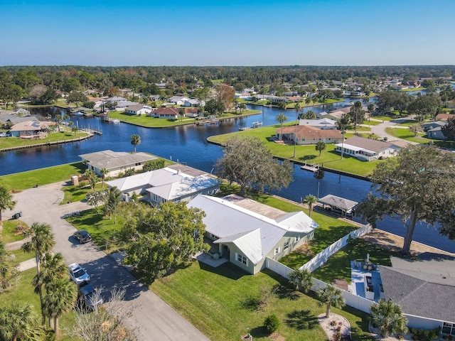 bird's eye view featuring a residential view and a water view