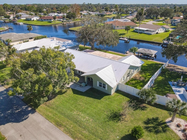 bird's eye view with a residential view and a water view
