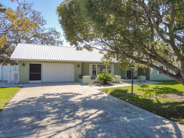 ranch-style home with a garage