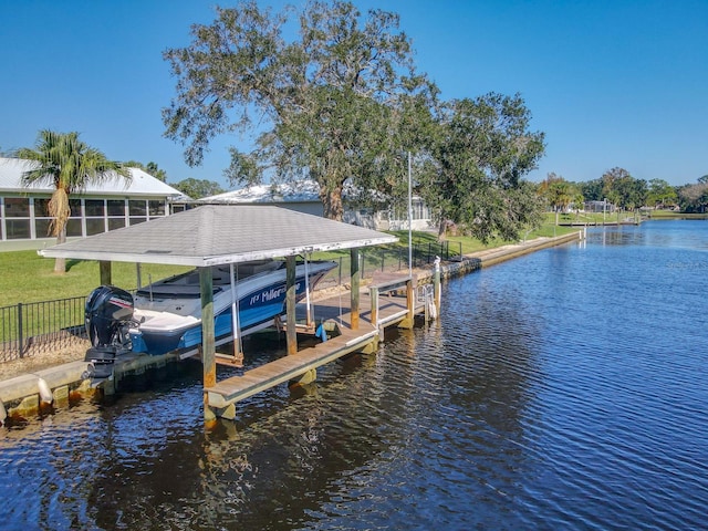 dock area featuring a water view