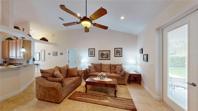 tiled living room featuring high vaulted ceiling and ceiling fan