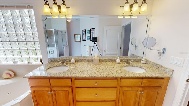 bathroom featuring vanity, a notable chandelier, and walk in shower