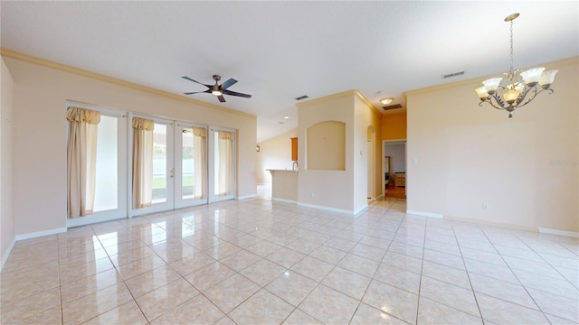 unfurnished room featuring french doors, ornamental molding, ceiling fan with notable chandelier, and light tile patterned floors