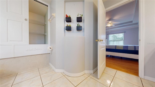 corridor with tile patterned floors