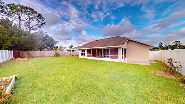 view of yard featuring a sunroom