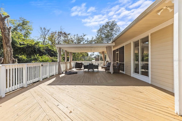 wooden deck featuring an outdoor hangout area