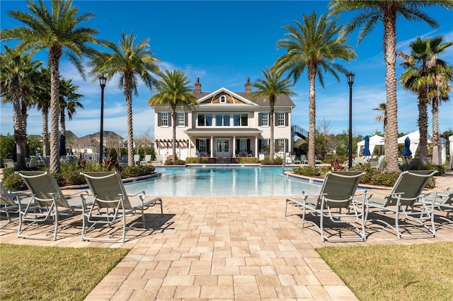 view of pool featuring a patio