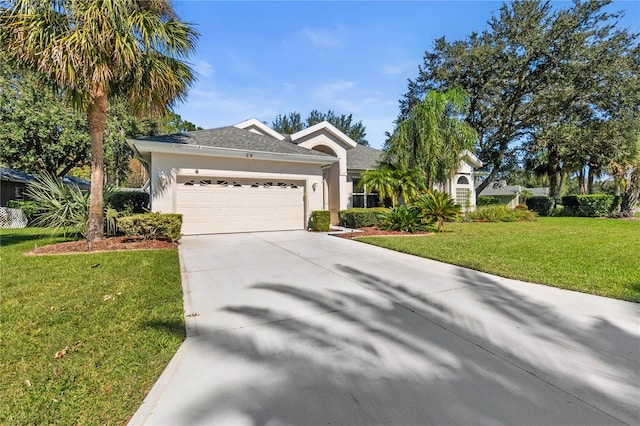 ranch-style home with a front lawn and a garage