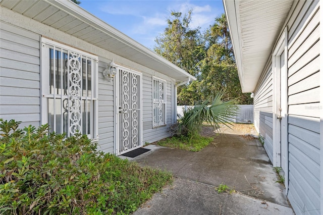 view of side of property featuring a patio