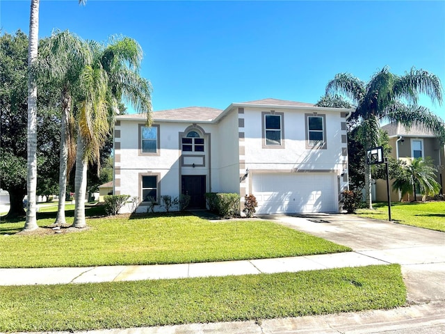 view of front of house with a front yard and a garage