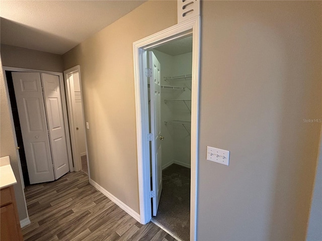 bathroom featuring vanity, a textured ceiling, and wood-type flooring