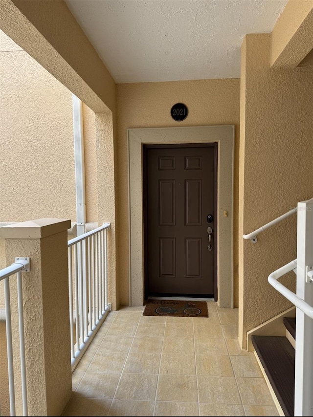 doorway to property with a balcony