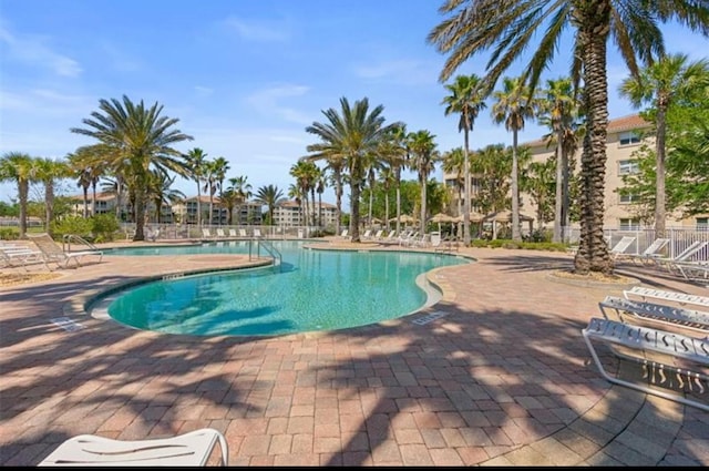 view of pool featuring a patio area