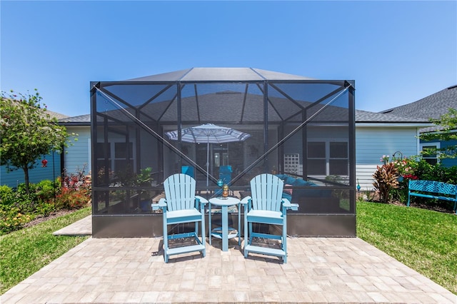 view of patio with a lanai