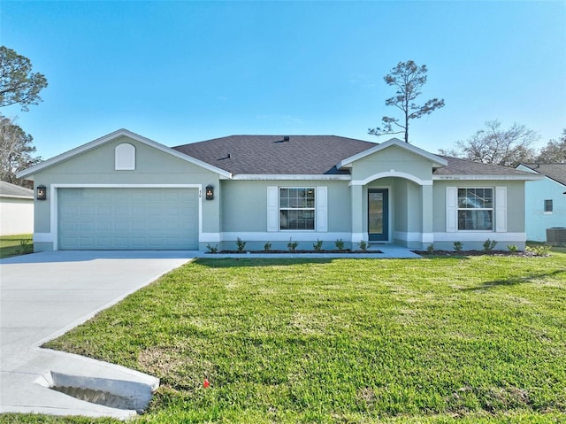 single story home featuring a shingled roof, a front lawn, concrete driveway, stucco siding, and a garage