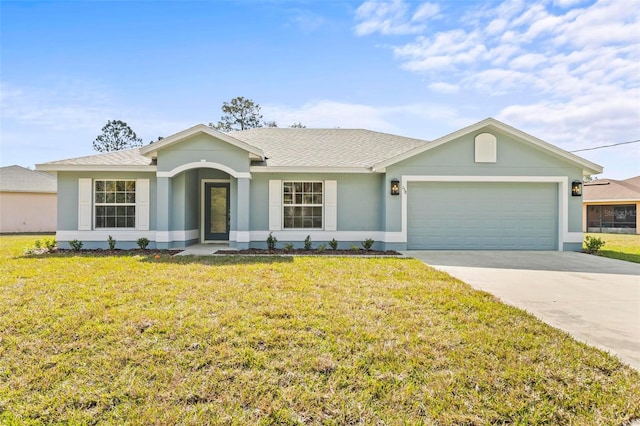 single story home featuring a garage and a front yard