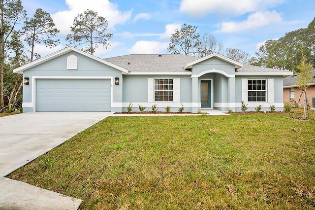 ranch-style home with a garage and a front yard