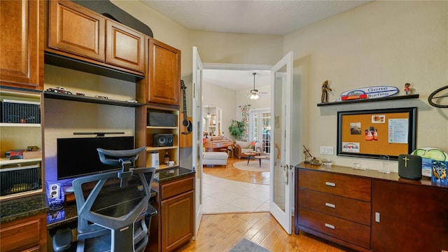 kitchen featuring french doors, ceiling fan, decorative light fixtures, and light wood-type flooring