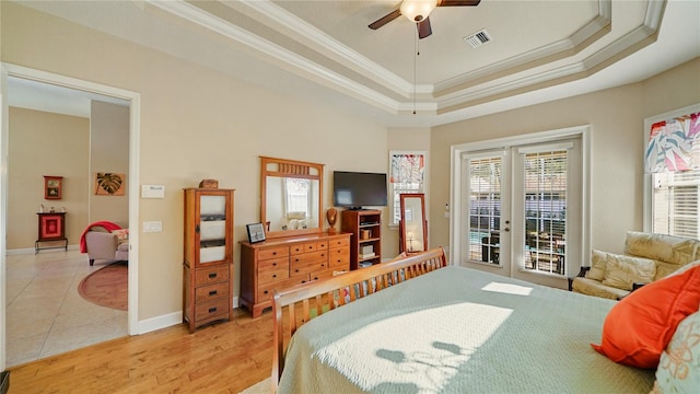 bedroom with french doors, hardwood / wood-style flooring, access to outside, ornamental molding, and ceiling fan