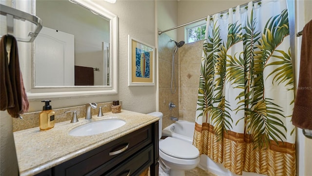 full bathroom with vanity, toilet, and shower / bath combo with shower curtain