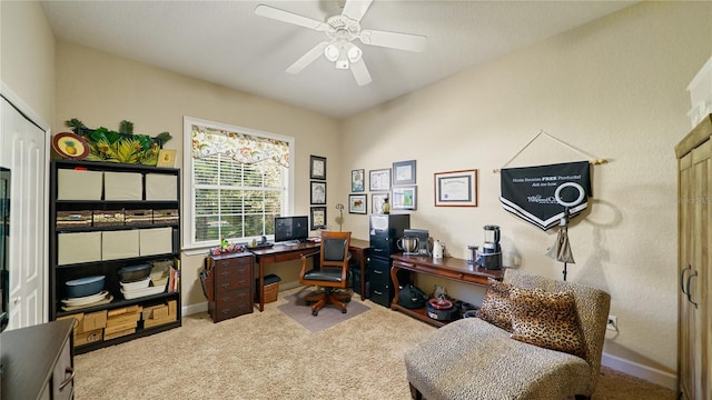 office featuring ceiling fan and light colored carpet