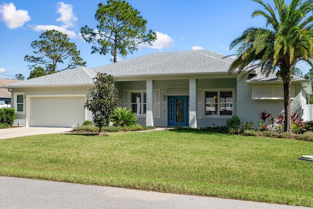 ranch-style home with a front lawn and a garage