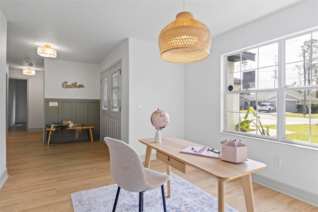 home office featuring light hardwood / wood-style floors