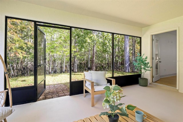 sunroom featuring a healthy amount of sunlight