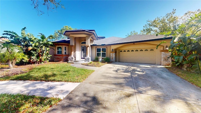 view of front of home with a garage