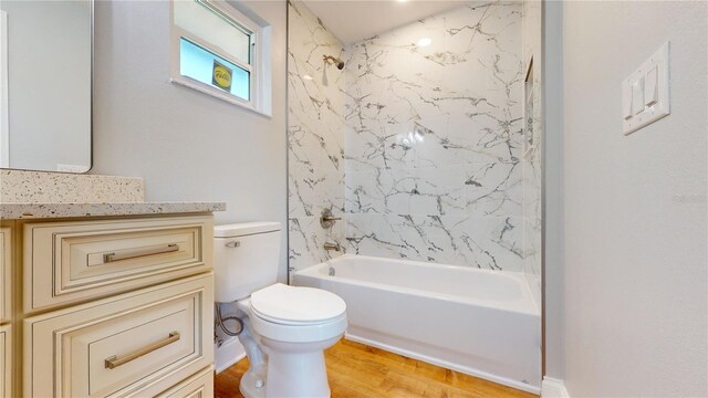 23 Augusta Trl, Palm Coast, FL 32137 - bathroom with toilet, bathing tub / shower combination, wood finished floors, and vanity
