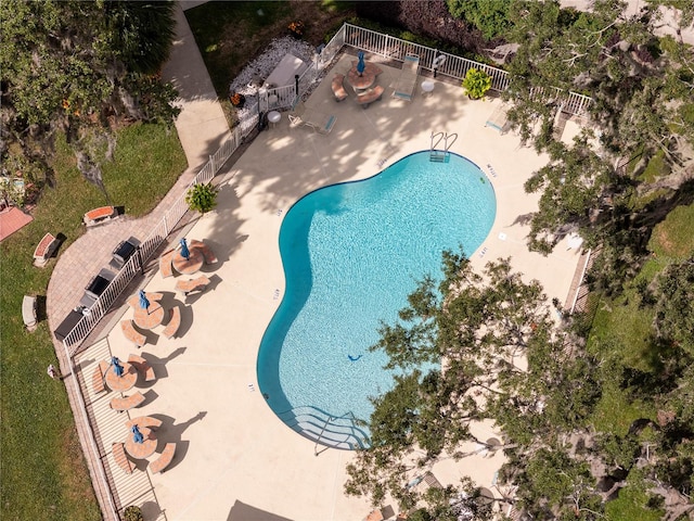 view of swimming pool with a patio