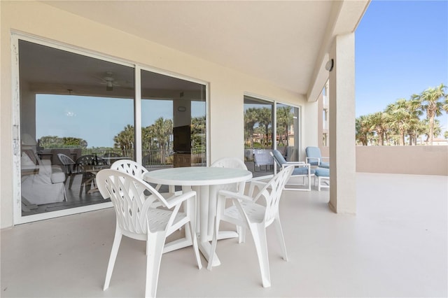 view of patio / terrace featuring ceiling fan