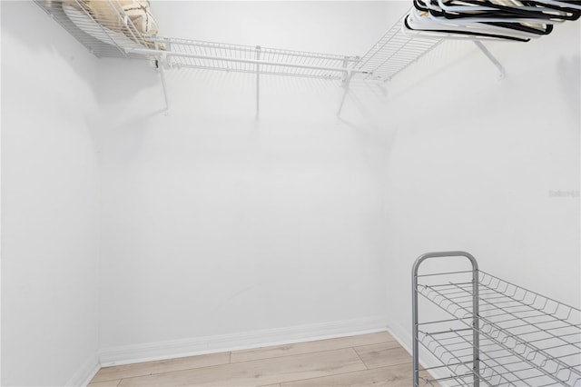 walk in closet featuring light wood-type flooring