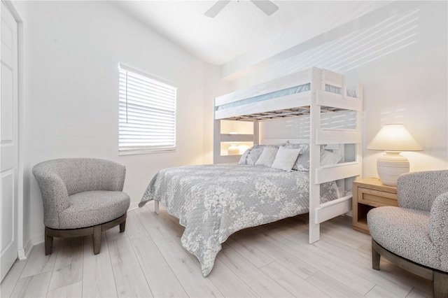 bedroom featuring hardwood / wood-style floors and ceiling fan