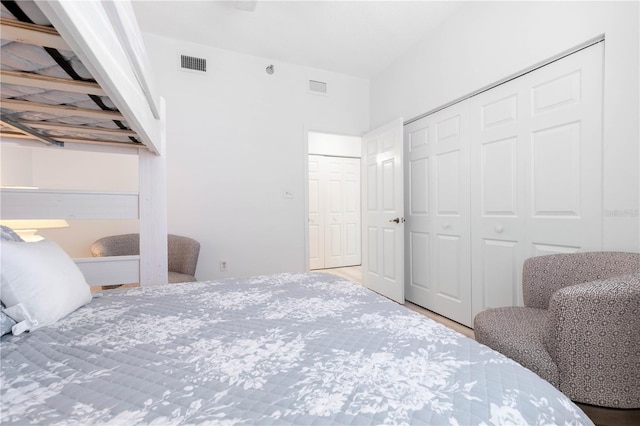 bedroom with hardwood / wood-style flooring