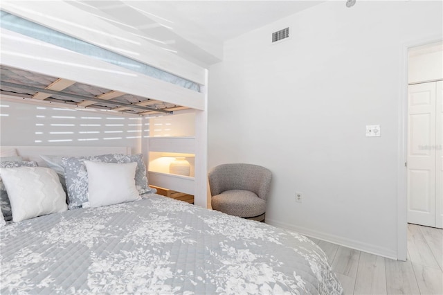 bedroom featuring light hardwood / wood-style floors