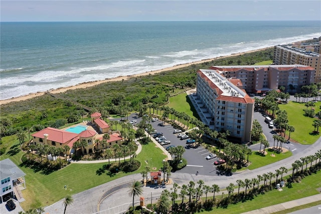 aerial view with a view of the beach and a water view