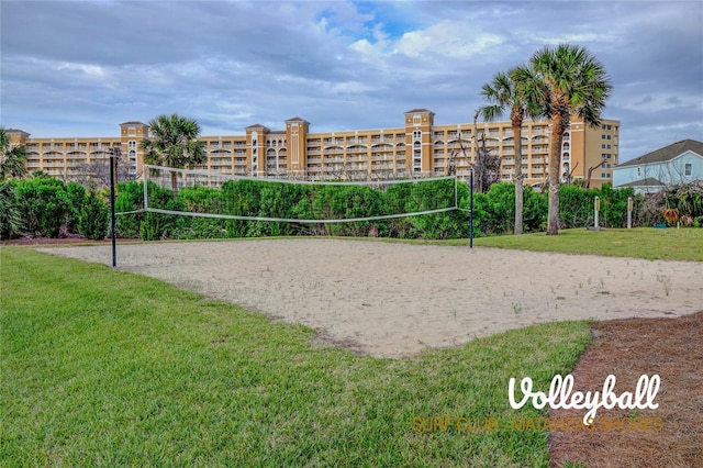 view of community featuring a yard and volleyball court