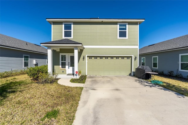 view of property with french doors, a front yard, and a garage