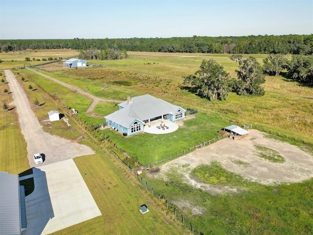 birds eye view of property featuring a rural view