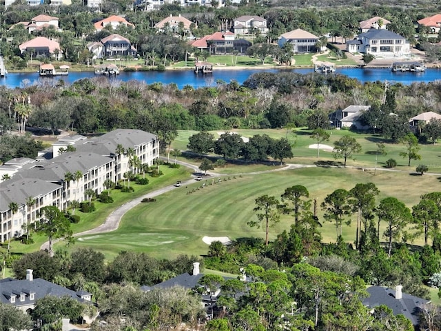 32 Shinnecock Dr, Palm Coast, FL 32137 - aerial view of property's location with a nearby body of water, nearby suburban area, and a tree filled landscape