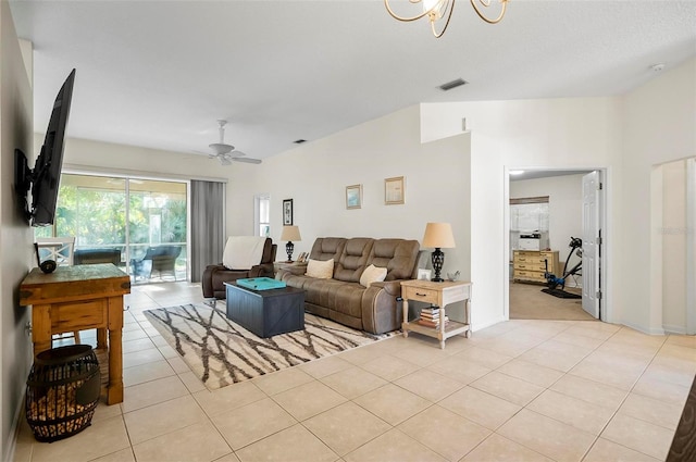 32 Shinnecock Dr, Palm Coast, FL 32137 - living room with light tile patterned flooring, ceiling fan, and a chandelier