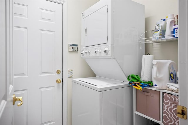 32 Shinnecock Dr, Palm Coast, FL 32137 - laundry room with stacked washer and clothes dryer