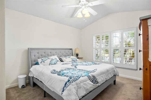 32 Shinnecock Dr, Palm Coast, FL 32137 - carpeted bedroom with lofted ceiling, baseboards, and ceiling fan