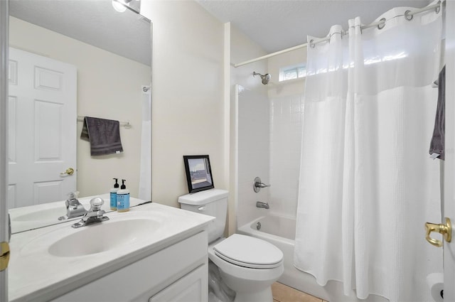 full bathroom featuring toilet, a textured ceiling, vanity, and shower / bath combination with curtain