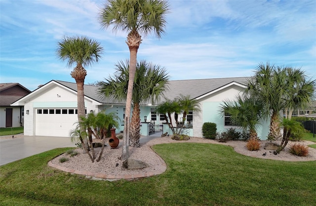 ranch-style home with a garage and a front yard