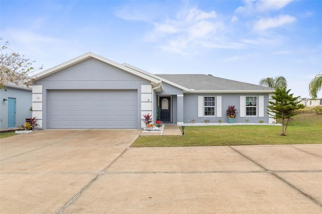 ranch-style home featuring a garage and a front yard