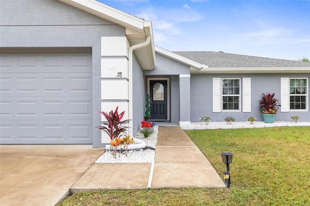 38 Colechester Ln, Palm Coast, FL 32137 - doorway to property with a yard, a garage, driveway, and stucco siding