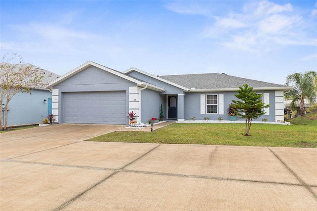 38 Colechester Ln, Palm Coast, FL 32137 - ranch-style house featuring a garage, stucco siding, driveway, and a front lawn